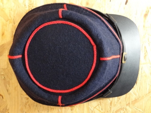 95th Pennsylvania Kepi, rote Litze, auen 100% Wolle, Futter 100% Baumwolle, Schirm / Schweiband 100% Leder