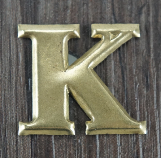 Kompaniebuchstabe K aus Messing
