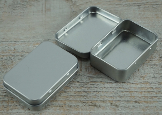 Klapp-Dose, rechteckig, klein, Pillendose, silberfarben, Material: elektrolytisches Weiblech