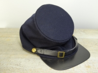 Bummers Kepi US dunkelblau, auen 100% Wolle, Futter 100% Baumwolle, Schirm / Schweiband 100% Leder